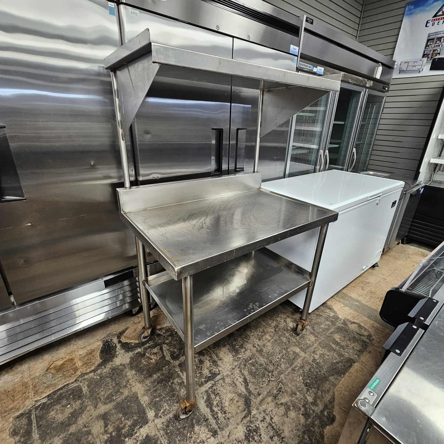 [USED] Stainless Steel Table w/ Over Shelf and Casters (42" W x 27" D x 65" H)