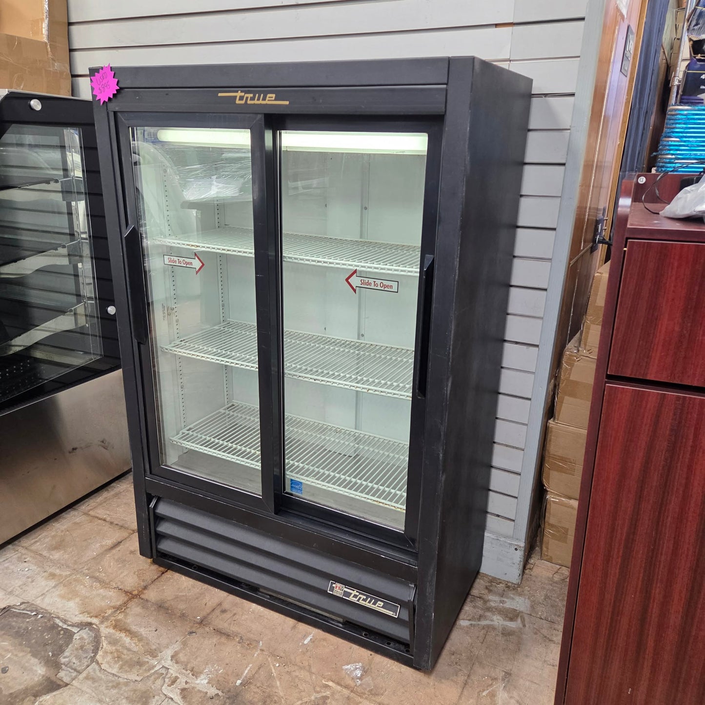 [USED] True GDM-33SSL-54-LD 36" 2 Sliding Glass Door Narrow Merchandiser Refrigerator (54" Height)