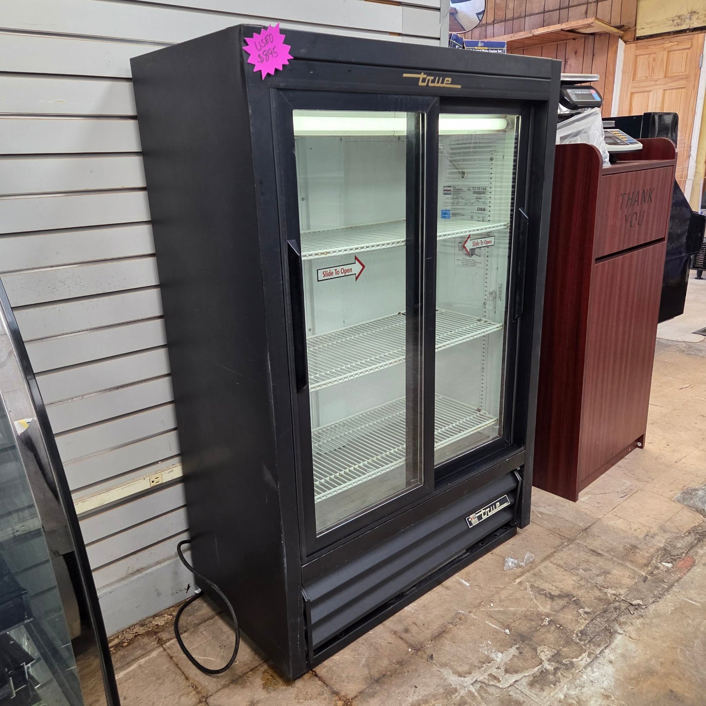 [USED] True GDM-33SSL-54-LD 36" 2 Sliding Glass Door Narrow Merchandiser Refrigerator (54" Height)